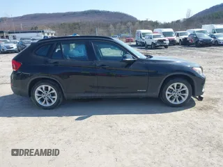 2013 BMW X1 xDrive28i with VIN WBAVL1C59DVR87469, listed as a IAAI auction lot 41775333 with 124,220 mi miles. Bid and sale history available at carsss.com. Image 13.