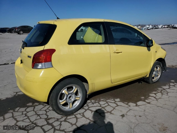 2009 Toyota Yaris with VIN JTDJT903895227558, listed as a Copart auction lot 46853025 with 128,246 mi miles and Salvage Title. Bid and sale history available at carsss.com. Image 3.