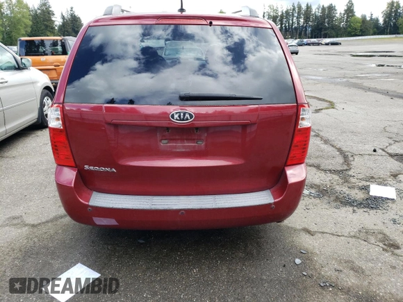 2010 Kia Sedona LX with VIN KNDMG4C32A6346589, listed as a Copart auction lot 53001474 with 139,923 mi miles and Salvage Title. Bid and sale history available at carsss.com. Image 6.