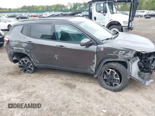 2020 Jeep Compass Trailhawk with VIN 3C4NJDDB3LT200268, listed as a IAAI auction lot 42250192 with 73,804 mi miles and . Bid and sale history available at DreamBid. Image 6.