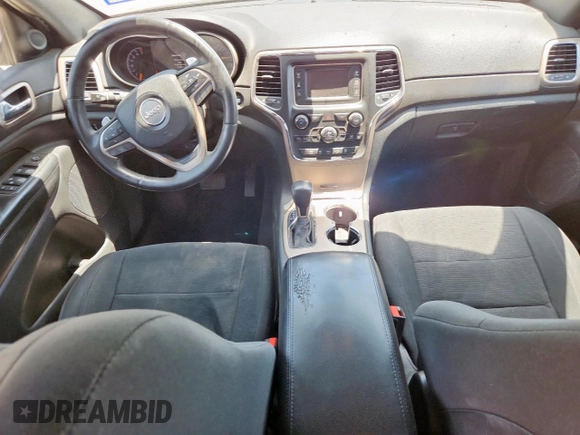2017 Jeep Grand Cherokee Laredo with VIN 1C4RJFAG7HC693789, listed as a Copart auction lot 61827925 with 143,019 mi miles and Salvage title. Bid and sale history available at DreamBid. Image 8.