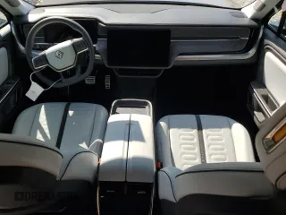 2023 Rivian R1S Adventure z VIN 7PDSGABAXPN010623, wystawiony jako Copart lot #72176294 z przebiegiem Nie podano mil oraz Szkody całkowita. Historia ofert i sprzedaży dostępna na DreamBid. Obrazek 8.