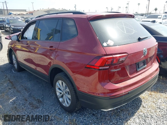 2018 Volkswagen Tiguan S with VIN 3VV1B7AX3JM128705, listed as a IAAI auction lot 42110808 with 60,589 mi miles and . Bid and sale history available at DreamBid. Image 3.