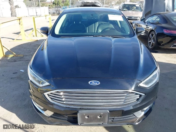2017 Ford Fusion Energi SE with VIN 3FA6P0PU7HR373391, listed as a IAAI auction lot 41677525 with 99,499 mi miles. Bid and sale history available at carsss.com. Image 12.