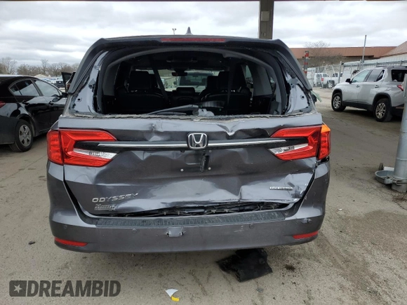 2022 Honda Odyssey Touring with VIN 5FNRL6H85NB023052, listed as a Copart auction lot 50884735 with 54,952 mi miles and Salvage Title. Bid and sale history available at DreamBid. Image 6.