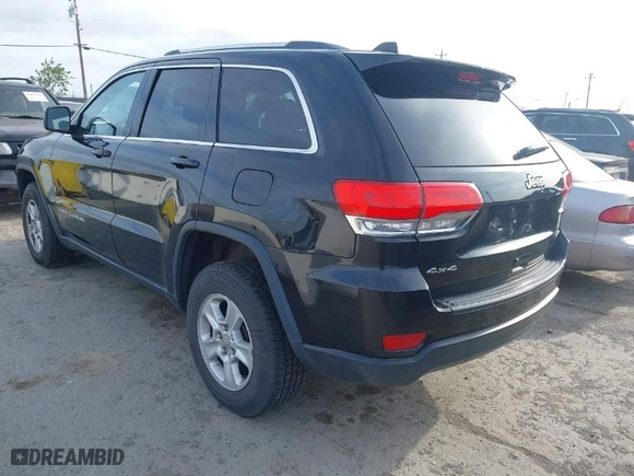2014 Jeep Grand Cherokee Laredo with VIN 1C4RJFAG9EC516138, listed as a IAAI auction lot 42055214 with 135,701 mi miles. Bid and sale history available at carsss.com. Image 3.