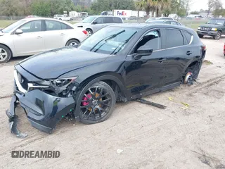 2019 Mazda CX-5 Touring with VIN JM3KFACM0K0692007, listed as a IAAI auction lot 41645657 with 1 mi miles. Bid and sale history available at carsss.com. Image 2.