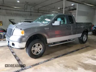 2006 Ford F-150 XLT with VIN 1FTPX14586NA77927, listed as a Copart auction lot 60548215 with 153,487 mi miles and Salvage title. Bid and sale history available at DreamBid. Image 1.