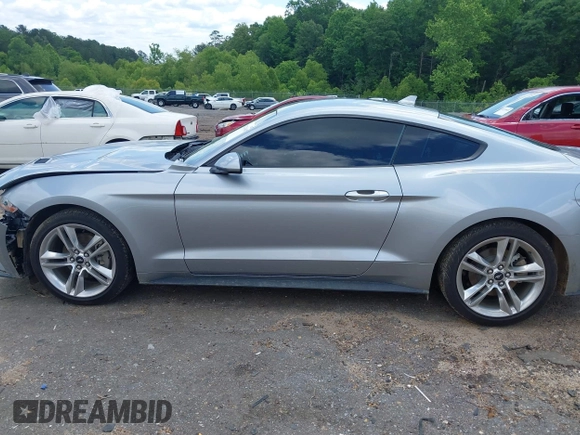 2021 Ford Mustang EcoBoost z VIN 1FA6P8TH1M5121107, wystawiony jako IAAI lot #42204097 z przebiegiem 51 542 mil mil oraz . Historia ofert i sprzedaży dostępna na DreamBid. Obrazek 14.