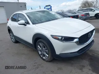 2023 Mazda CX-30 S Carbon Edition with VIN 3MVDMBCM8PM560726, listed as a IAAI auction lot 41949740 with 35,164 mi miles and . Bid and sale history available at carsss.com. Image 1.