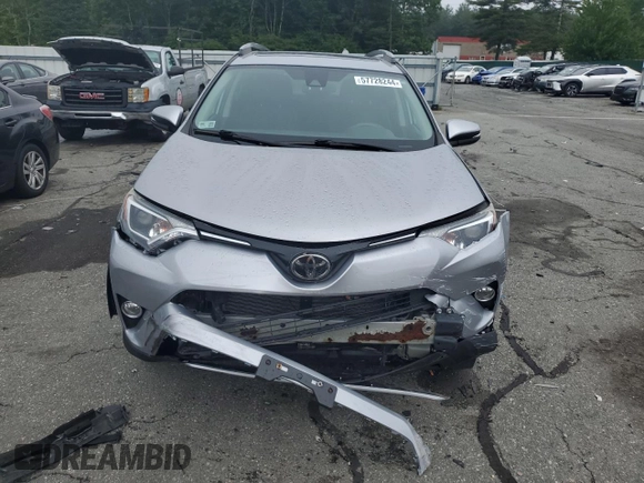 2018 Toyota RAV4 XLE with VIN 2T3RFREV8JW741461, listed as a Copart auction lot 57728244 with 88,925 mi miles and Salvage Title. Bid and sale history available at DreamBid. Image 5.