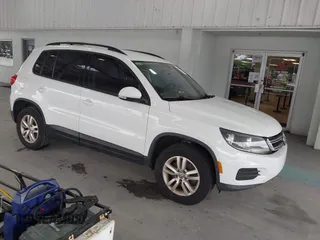 2017 Volkswagen Tiguan S with VIN WVGAV7AX3HK000029, listed as a IAAI auction lot 40605208 with 72,014 mi miles and . Bid and sale history available at DreamBid. Image 1.