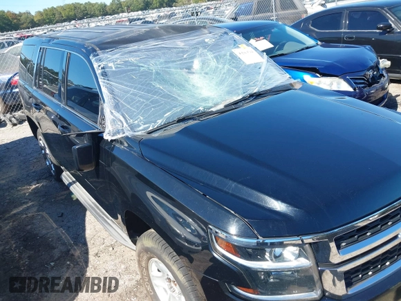 2015 Chevrolet Tahoe Commercial with VIN 1GNLC2EC3FR280365, listed as a IAAI auction lot 40580594 with 195,740 mi miles and . Bid and sale history available at DreamBid. Image 6.