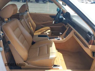 1991 Mercedes-Benz 560 with VIN WDBCA45E7MA610580, listed as a IAAI auction lot 42099161 with 83,344 mi miles and . Bid and sale history available at DreamBid. Image 5.