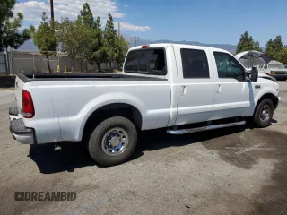 2003 Ford Super Duty F-250 XL with VIN 1FTNW20S43EA50117, listed as a Copart auction lot 70412844 with 224,403 mi miles and Salvage Title. Bid and sale history available at carsss.com. Image 3.