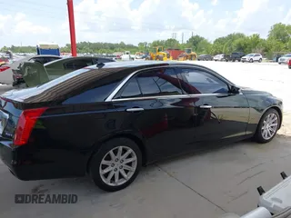 2014 Cadillac CTS RWD with VIN 1G6AP5SX4E0149156, listed as a IAAI auction lot 42681914 with 49,539 mi miles and . Bid and sale history available at DreamBid. Image 14.