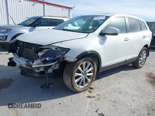 2014 Mazda CX-9 Grand Touring with VIN JM3TB3DA8E0427369, listed as a IAAI auction lot 41860129 with 152,888 mi miles and . Bid and sale history available at DreamBid. Image 18.