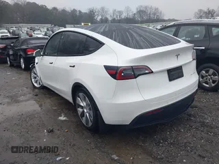 2021 Tesla Model Y Long Range with VIN 5YJYGDEEXMF228914, listed as a IAAI auction lot 41409806 with 48,276 mi miles. Bid and sale history available at carsss.com. Image 3.