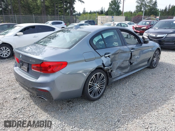 2018 BMW 5 Series 540i z VIN WBAJE5C54JG917877, wystawiony jako IAAI lot #42235433 z przebiegiem 103 375 mil mil oraz . Historia ofert i sprzedaży dostępna na DreamBid. Obrazek 4.
