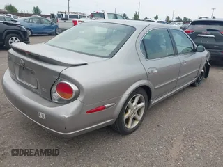 2003 Nissan Maxima SE with VIN JN1DA31DX3T521797, listed as a IAAI auction lot 42737605 with 150,045 mi miles and . Bid and sale history available at DreamBid. Image 4.