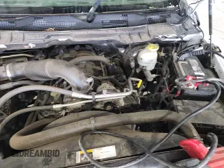 2021 Ram 1500 SLT z VIN 1C6RR7TT2MS521640, wystawiony jako Copart lot #62607175 z przebiegiem 86 917 mil mil oraz Czysty tytuł • Clean title. Historia ofert i sprzedaży dostępna na DreamBid. Obrazek 13.