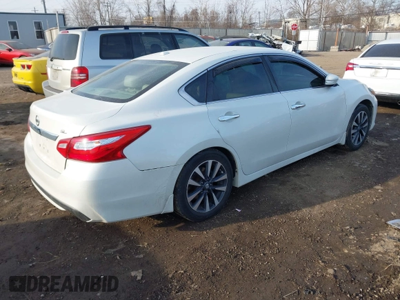 2016 Nissan Altima SR with VIN 1N4AL3AP8GC169495, listed as a IAAI auction lot 41792151 with 131,918 mi miles and . Bid and sale history available at carsss.com. Image 4.