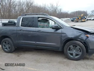 2023 Honda Ridgeline RTL z VIN 5FPYK3F58PB014460, wystawiony jako IAAI lot #41875307 z przebiegiem 77 565 mil mil oraz . Historia ofert i sprzedaży dostępna na DreamBid. Obrazek 13.
