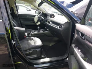 2019 Mazda CX-5 Touring with VIN JM3KFACM6K0672294, listed as a IAAI auction lot 42003210 with 50,127 mi miles. Bid and sale history available at carsss.com. Image 5.
