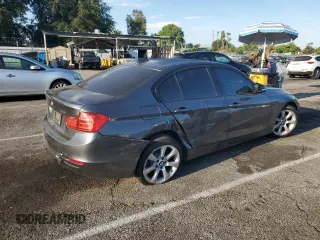 2015 BMW 3 Series 328i with VIN WBA3C1C51FP116967, listed as a Copart auction lot 65348565 with 93,052 mi miles and Salvage title. Bid and sale history available at DreamBid. Image 3.