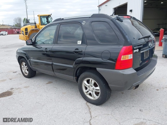 2007 Kia Sportage LX with VIN KNDJE723077397667, listed as a IAAI auction lot 42011122 with 218,744 mi miles. Bid and sale history available at carsss.com. Image 3.