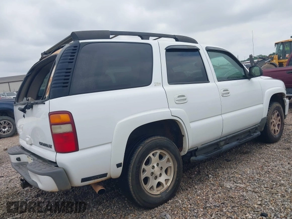 2003 Chevrolet Tahoe LS with VIN 1GNEK13Z63R135474, listed as a IAAI auction lot 42127546 with 318,623 mi miles and . Bid and sale history available at DreamBid. Image 4.