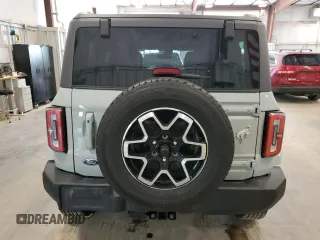2022 Ford Bronco z VIN 1FMEE5DP8NLB90711, wystawiony jako Copart lot #63755395 z przebiegiem 22 660 mil mil oraz Szkoda całkowita • Salvage title. Historia ofert i sprzedaży dostępna na DreamBid. Obrazek 6.