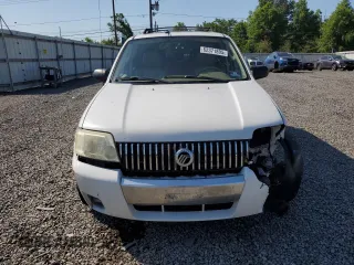 2007 Mercury Mariner Premier with VIN 4M2CU97107KJ12925, listed as a Copart auction lot 62371895 with 141,576 mi miles and Salvage title. Bid and sale history available at DreamBid. Image 5.