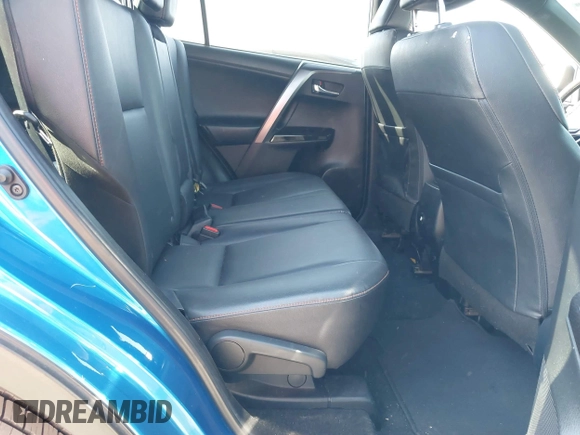 2018 Toyota RAV4 SE with VIN JTMNFREV3JJ156865, listed as a IAAI auction lot 41986697 with 124,979 mi miles and . Bid and sale history available at DreamBid. Image 8.