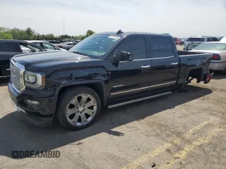 2018 GMC Sierra 1500 Denali z VIN 3GTU2PEJ5JG595009, wystawiony jako Copart lot #56787255 z przebiegiem 77 034 mil mil oraz Szkoda całkowita • Salvage title. Historia ofert i sprzedaży dostępna na DreamBid. Obrazek 1.