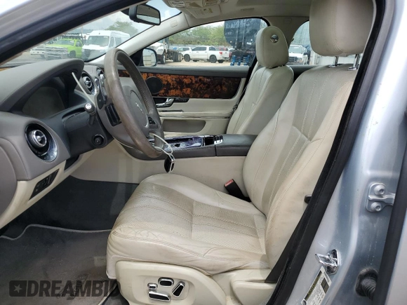 2011 Jaguar XJ with VIN SAJWA1CB9BLV05595, listed as a Copart auction lot 54947855 with 39,516 mi miles and Salvage title. Bid and sale history available at DreamBid. Image 7.