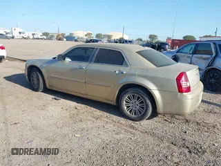 2010 Chrysler 300 Touring with VIN 2C3CA5CV0AH167992, listed as a IAAI auction lot 41985352 with 235,816 mi miles. Bid and sale history available at carsss.com. Image 3.