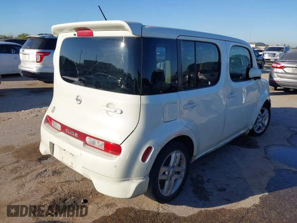 2009 Nissan Cube SL z VIN JN8AZ28R19T106532, wystawiony jako IAAI lot #40675288 z przebiegiem Nie podano mil oraz . Historia ofert i sprzedaży dostępna na DreamBid. Obrazek 4.