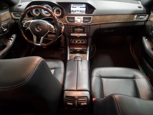 2015 Mercedes-Benz E 350 Luxury with VIN WDDHH8JB9FB109473, listed as a Copart auction lot 46889635 with 145,749 mi miles and Salvage title. Bid and sale history available at DreamBid. Image 8.