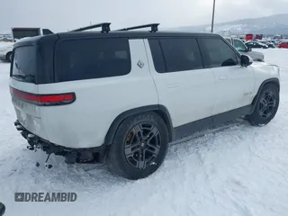 2023 Rivian R1S Adventure z VIN 7PDSGABA9PN015327, wystawiony jako IAAI lot #41484133 z przebiegiem Nie podano mil oraz . Historia ofert i sprzedaży dostępna na DreamBid. Obrazek 4.