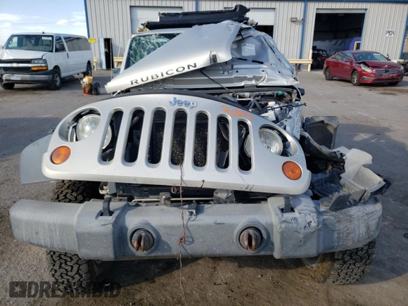 2007 Jeep Wrangler Rubicon with VIN 1J8GA64167L149306, listed as a Copart auction lot 69264743 with Not provided miles and Salvage title. Bid and sale history available at DreamBid. Image 5.