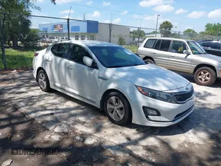 2015 Kia Optima Hybrid with VIN KNAGM4ADXF5081576, listed as a IAAI auction lot 41926126 with 1 mi miles. Bid and sale history available at carsss.com. Image 1.