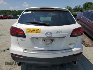 2015 Mazda CX-9 Grand Touring z VIN JM3TB2DA3F0452160, wystawiony jako Copart lot #60220655 z przebiegiem 145 185 mil mil oraz Szkoda całkowita • Salvage title. Historia ofert i sprzedaży dostępna na DreamBid. Obrazek 6.