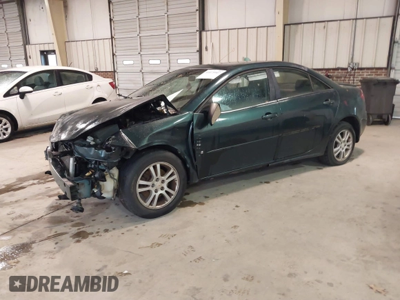 2006 Pontiac G6 6-Cyl z VIN 1G2ZG558664233613, wystawiony jako IAAI lot #41075907 z przebiegiem 228 361 mil mil oraz . Historia ofert i sprzedaży dostępna na DreamBid. Obrazek 17.