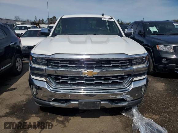 2017 Chevrolet Silverado 1500 LTZ with VIN 1GCVKSECXHZ305981, listed as a Copart auction lot 51273425 with 77,465 mi miles and Salvage Title. Bid and sale history available at DreamBid. Image 5.