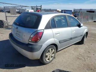 2009 Kia Rio LX with VIN KNADE243596530314, listed as a IAAI auction lot 41681050 with 114,831 mi miles. Bid and sale history available at carsss.com. Image 4.