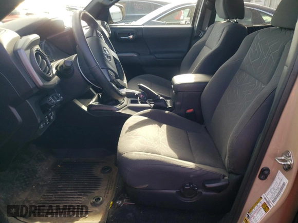 2017 Toyota Tacoma SR5 with VIN 5TFCZ5AN8HX063179, listed as a Copart auction lot 79604714 with 82,316 mi miles and Salvage Title. Bid and sale history available at DreamBid. Image 7.