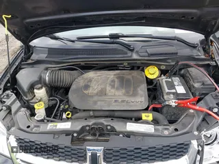 2019 Dodge Grand Caravan SXT with VIN 2C4RDGCG9KR804867, listed as a IAAI auction lot 42032311 with 157,351 mi miles and . Bid and sale history available at DreamBid. Image 10.