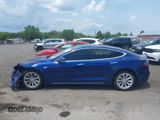 2016 Tesla Model S 70 with VIN 5YJSA1E17GF149479, listed as a IAAI auction lot 42609734 with 175,007 mi miles and . Bid and sale history available at DreamBid. Image 14.