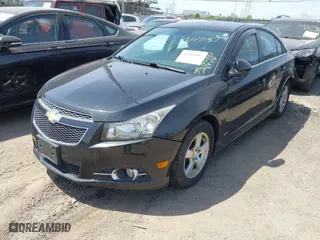 2014 Chevrolet Cruze 1LT with VIN 1G1PC5SB2E7149180, listed as a IAAI auction lot 42010987 with 122,787 mi miles. Bid and sale history available at carsss.com. Image 2.